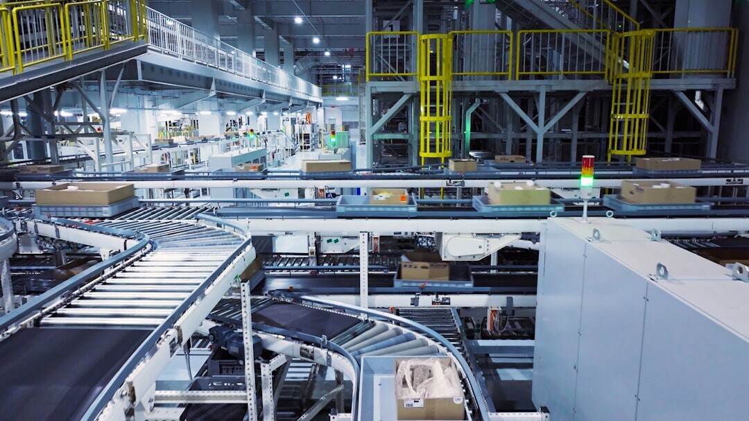 Industrial automation robot arm working in a smart factory